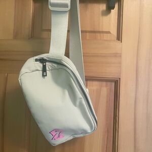 Trendy Off-White Crossbody or Waist Bag with Pink Logo